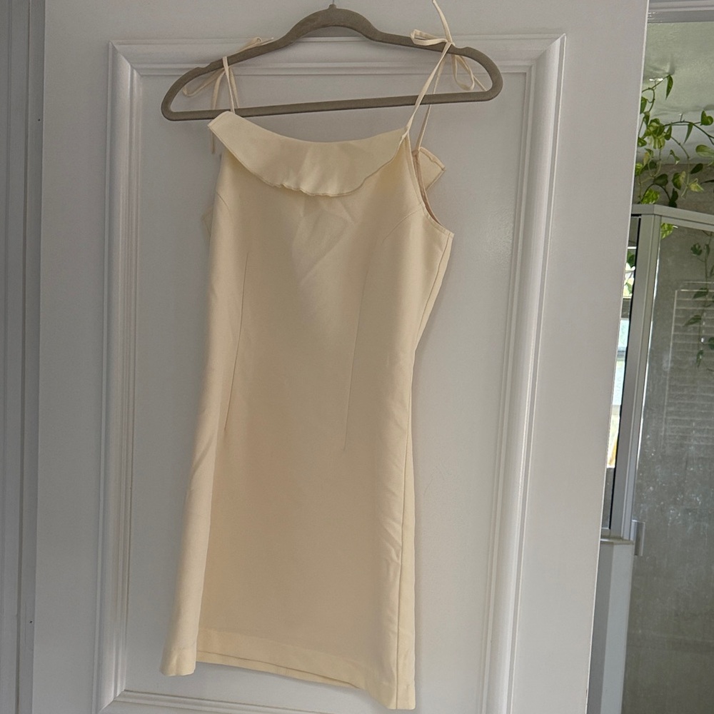 Sleeveless Cream Mini Dress with Ruffle Neckline